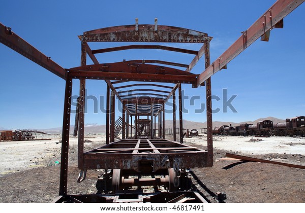 Photograph of a train\
wreck in Uyuni,\
Bolivia