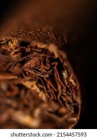 Photographed tobacco in a cigarette in an approximate close up way