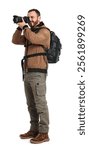 Photographer with backpack and camera taking picture on white background