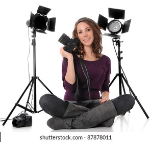 Photographer With Camera And Studio Lights