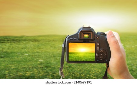 Photographer with camera at work