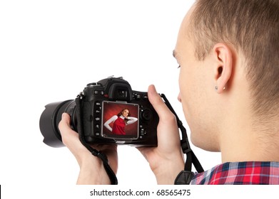 Photographer Checking His Photo On The Back Of The Camera LCD Display