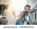 Photographer, city and man with camera, memory and travel with creativity, vacation and urban explore. Male person, destination and journalist for photography, research and tourism adventure abroad