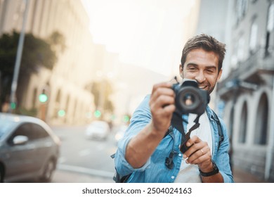 Photographer, city and man with camera, memory and travel with creativity, vacation and urban explore. Male person, destination and journalist for photography, research and tourism adventure abroad - Powered by Shutterstock