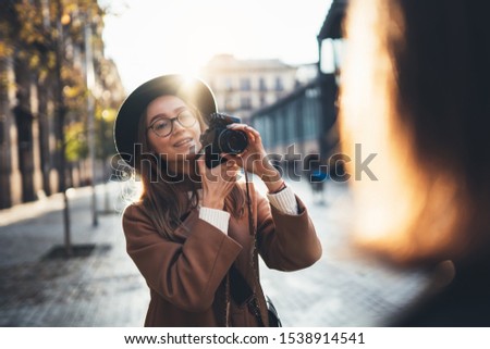 Similar – Long hair girl with hat and sunglasses walking in Sydney city streets in Australia.