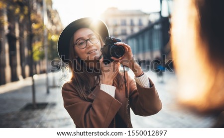 Similar – Long hair girl with hat and sunglasses walking in Sydney city streets in Australia.