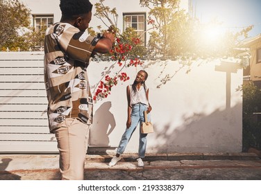 Photographer With Model For Summer Fashion Photography Taking Photo, Posing And Smiling For Portrait Shot With Lens Flare. African Creative Freelancer Taking Picture Of Young Influencer Woman