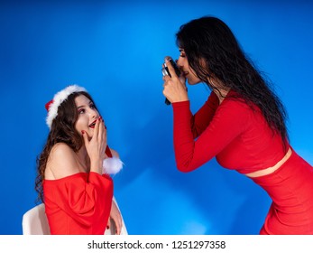 Photographer and model, Photographer Woman Santa, photographing woman in santa, 2019, 2020 Photo Shoot