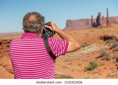 Photographer At Monument Valley.