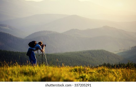 photographer photographed mountains in summer, photographs fog. - Shutterstock ID 337205291