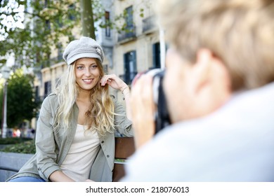 Photographer Photographing Fashion Model In Street