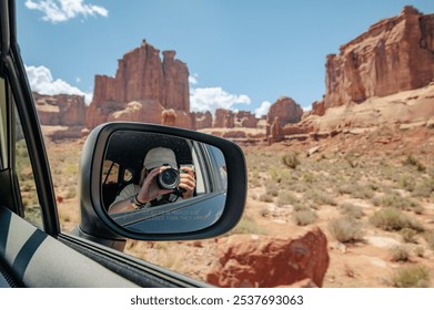 Photographer Reflected in Car Mirror with Arches National Park S - Powered by Shutterstock