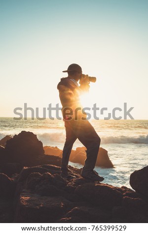 Photographer standing on the cliff