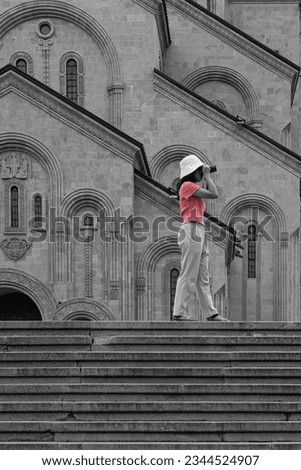 Photographer Taking Picture of Holy Trinity Cathedral of Tbilisi Geougia. Fade Color