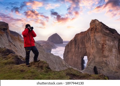 Photographer Is Taking Pictures Of The Beautiful Seaside View On The Oregon Coast. Taken In Cape Kiwanda, Pacific City, During A Cloudy Winter Sunset.