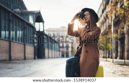 Similar – Long hair girl with hat and sunglasses walking in Sydney city streets in Australia.