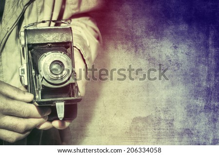 Photographer with vintage camera