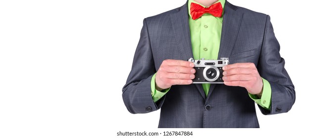 Photographer Visiting Card Mockup. Vintage Film Photo Camera In A Photographer Hands Isolated On A White Background With Copy Space.