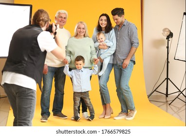 Photographer Working With Family In Studio