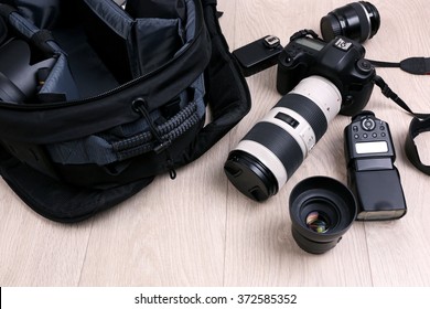 Photographer's equipment on the floor in a room
