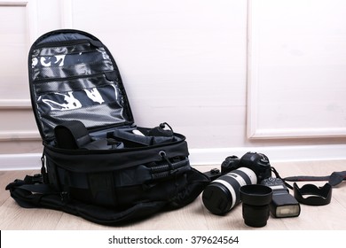 Photographer's equipment on the floor in a room