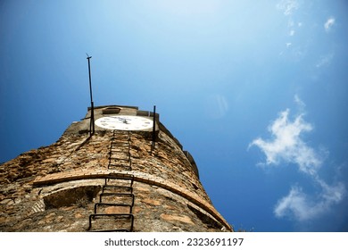 Photographic documentation of the clock tower at the castle of Riomaggiore in the Cinque Terre La spezia Italy