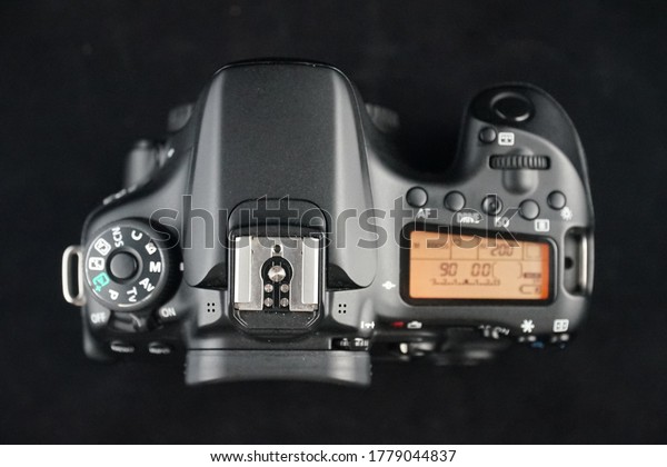 Photographic DSLR\
camera equipment close up\
tops