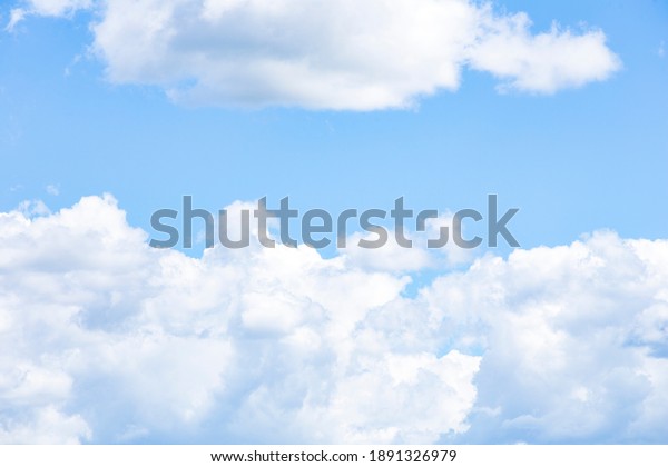 Photographic record of\
blue sky with\
clouds