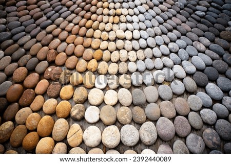 Photographic shot of the multicolor composition of a mosaic made of stones 
