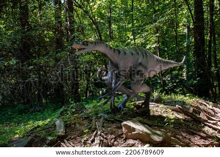 Photographs of fighting dinosaurs in a dinopark popular with tourists