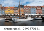 Photographs taken from different angles on the streets of Copenhagen the capital of Denmark churches, panoramic views of the city buildings and statues