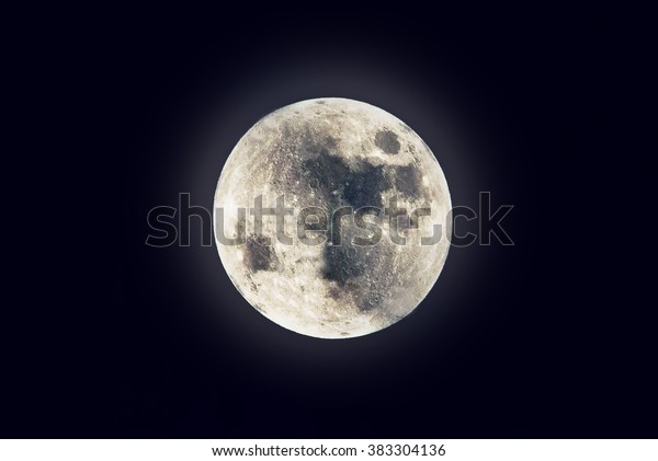Photography of\
nightly sky with large moon and\
stars