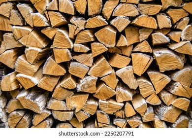 Photography on theme big wall of stacked oak tree logs in cracks, photo consisting of old oak tree logs on nature background, oak tree logs from textured round annual rings with stripes various size - Shutterstock ID 2250207791