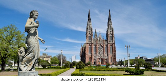 Photography Of The Principal Square Of La Plata City, Argentina, With The Cathedral Building Behind And A Beautiful Woman Statue On The Foreground