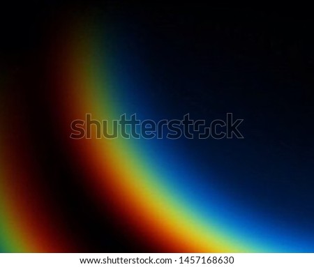 Photography of rainbow. Rainbow on black background.  Abstract web background. Banners and panels. Design background. Computer. Desktop background and design. Unique. Surrealistic. Dispersion of light