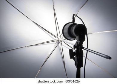 Photography Set Up With Umbrella Reflecting Modeling Lamp