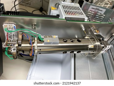 A photography showing an opened mass spectrometer and a mass spectrometry analyser. Selected focus. - Shutterstock ID 2121942137