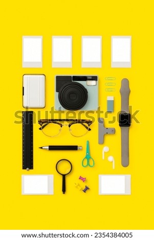 Photography theme, stationary flat lay with instant photo mockups on yelow background.