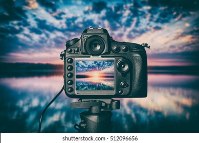 photography view camera photographer lens lense video photo digital glass blurred focus landscape photographic color concept sunset lake water vacations sunrise sun light sky cloud - stock image - Powered by Shutterstock