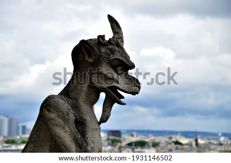 Similar – Image, Stock Photo Gargoyle on Notre Dame In Paris at sunset