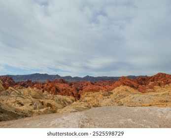 Photos of Valley of Fire, Nevada, often showcase stunning red sandstone formations, vibrant desert landscapes, and sweeping views of jagged rocks, arches, and petroglyphs under clear blue skies - Powered by Shutterstock