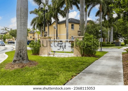 Photoshoot Footage  for entrance design in Florida, USA , showcasing modern architectural design, stone Path palm trees, beautiful vegetation, blue sky and Nature.