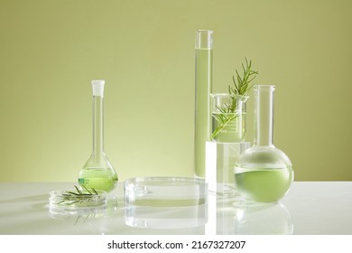 Photoshoot over the course of experiment on green leaf , the research on chemistry lab , fluid in beaker and laboratory equipment and transparent podium with blank space for product - Shutterstock ID 2167327207