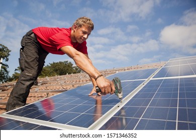 Photovoltaic installation on roof in Landshut, Bayern, Germany - Shutterstock ID 1571346352