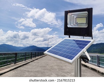 Photovoltaic Spotlights Use Solar Energy On The Dam Ridge. Pure Energy Concept