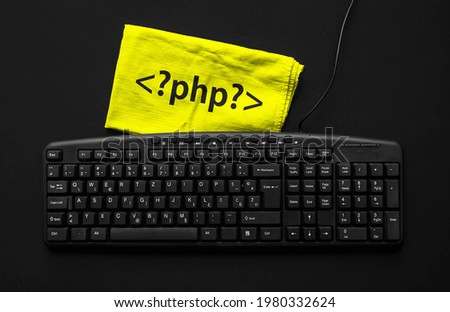 PHP programming language. Rag width word PHP and pc keyboard.