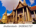 Phra sri ratana golden chedi and phra monhob buidling (the royal pantheon) and monks, wat phra kaew, grand palace, bangkok, thailand