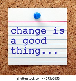 The phrase Change is a Good Thing on a note card pinned to a cork notice board as a reminder to embrace change and the opportunities it can offer