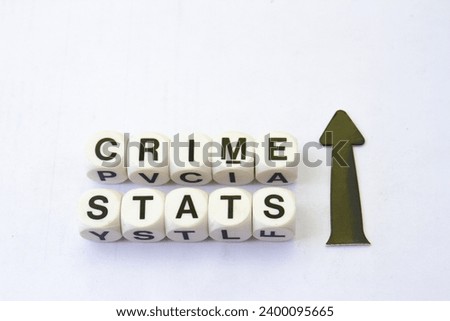 The phrase crime stats with an upward pointing arrow isolated on a clear background with copy space