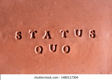  The Phrase  “Status Quo” ( Factual Situation) Written In Latin On A Terracotta Tablet